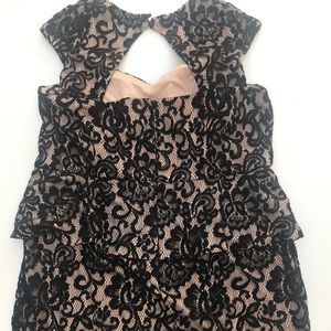 Formal peplum nude and black lace dress